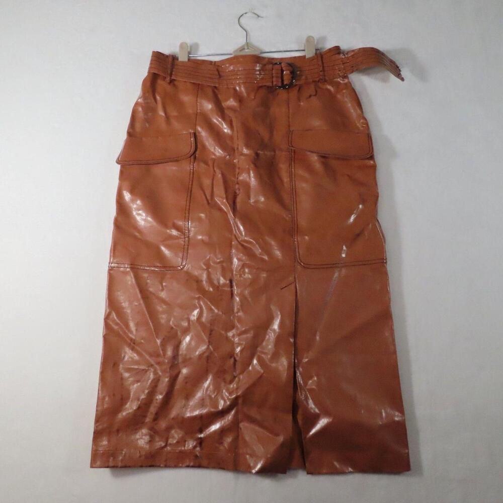 The Topshop Cognac Patent Faux Leather Cargo Midi Skirt is a stylish and versati
